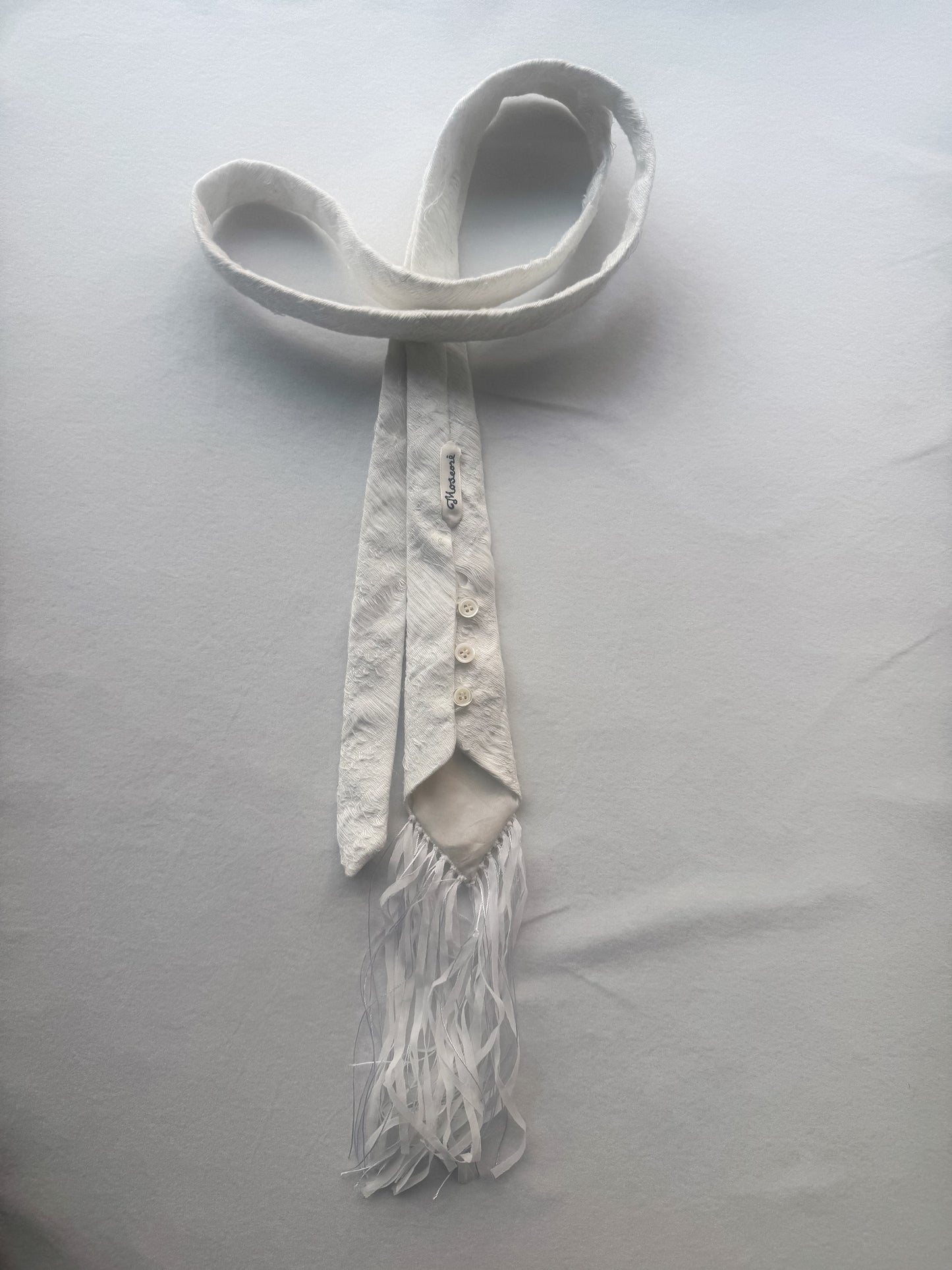 TASSEL EDGE TIE