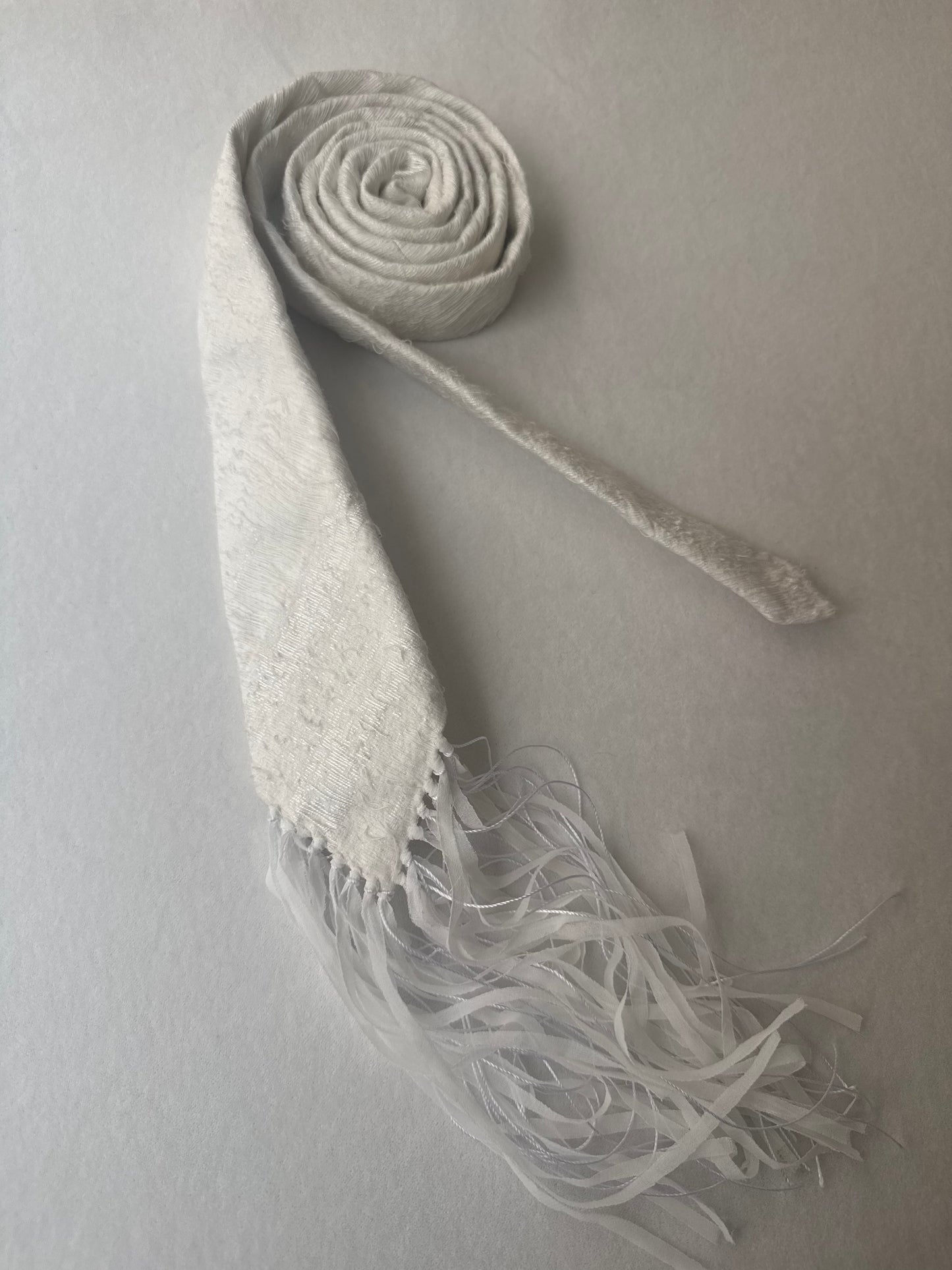 TASSEL EDGE TIE