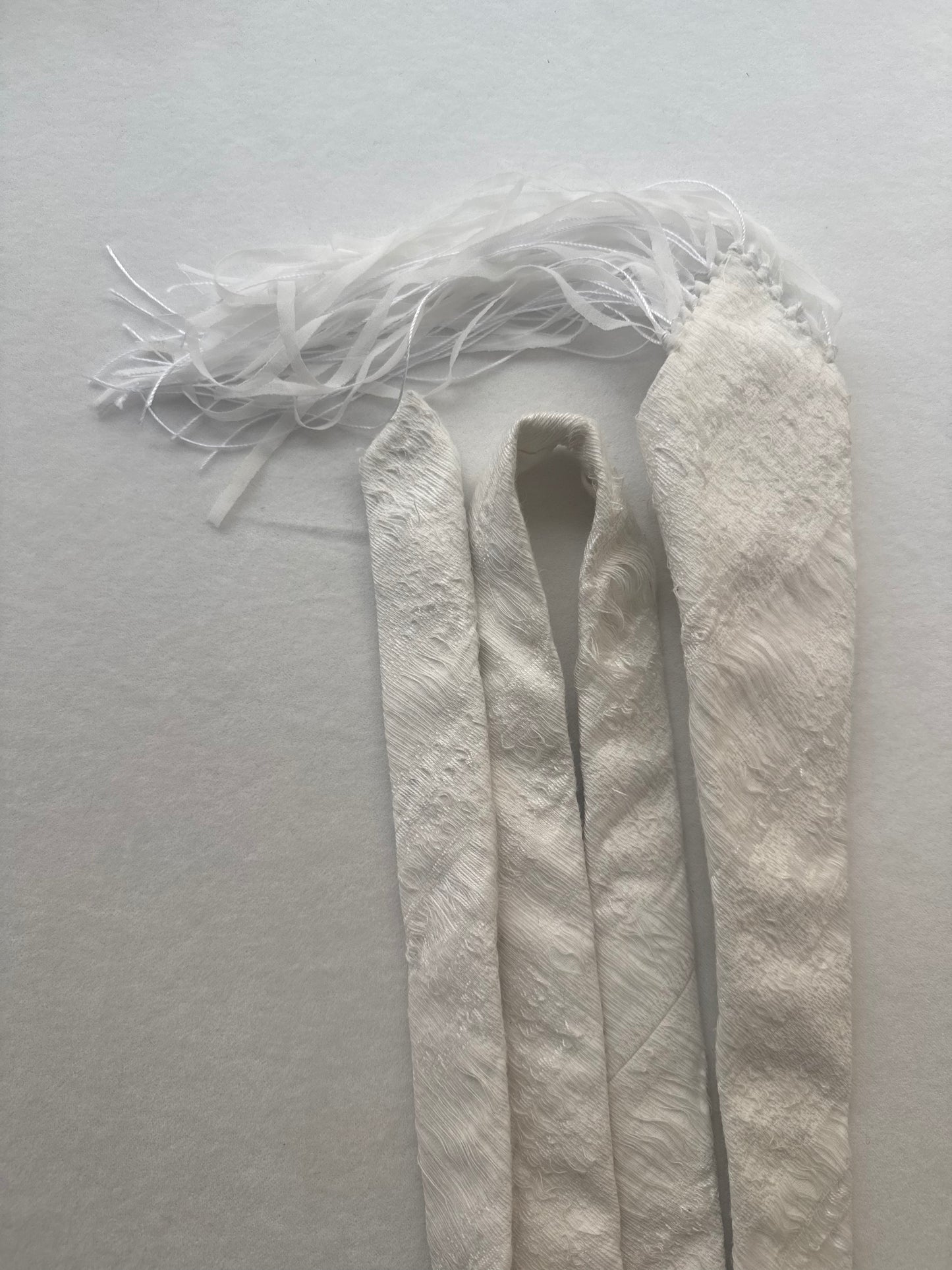 TASSEL EDGE TIE