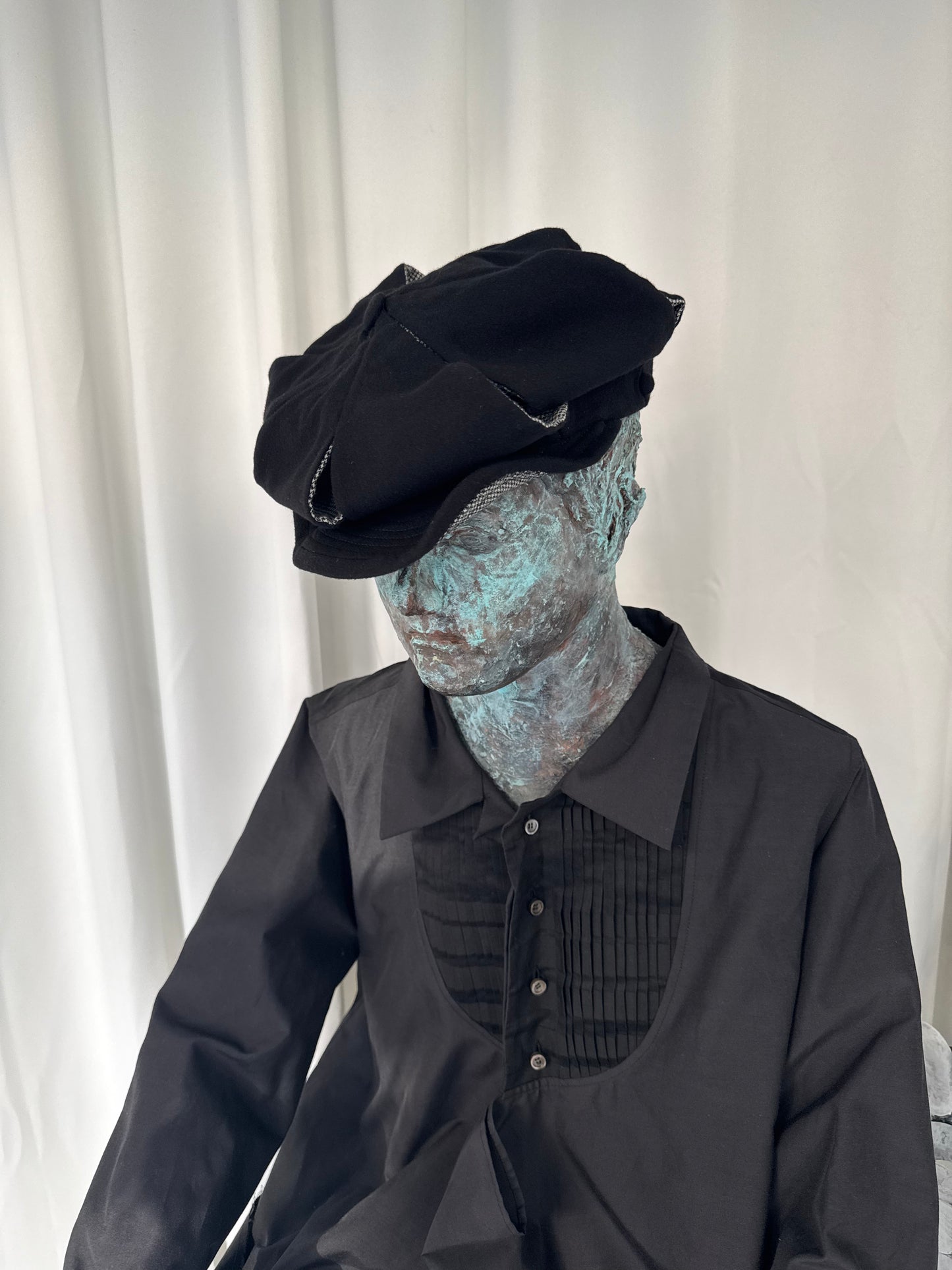 SLASHED REVERSIBLE NEWSBOY