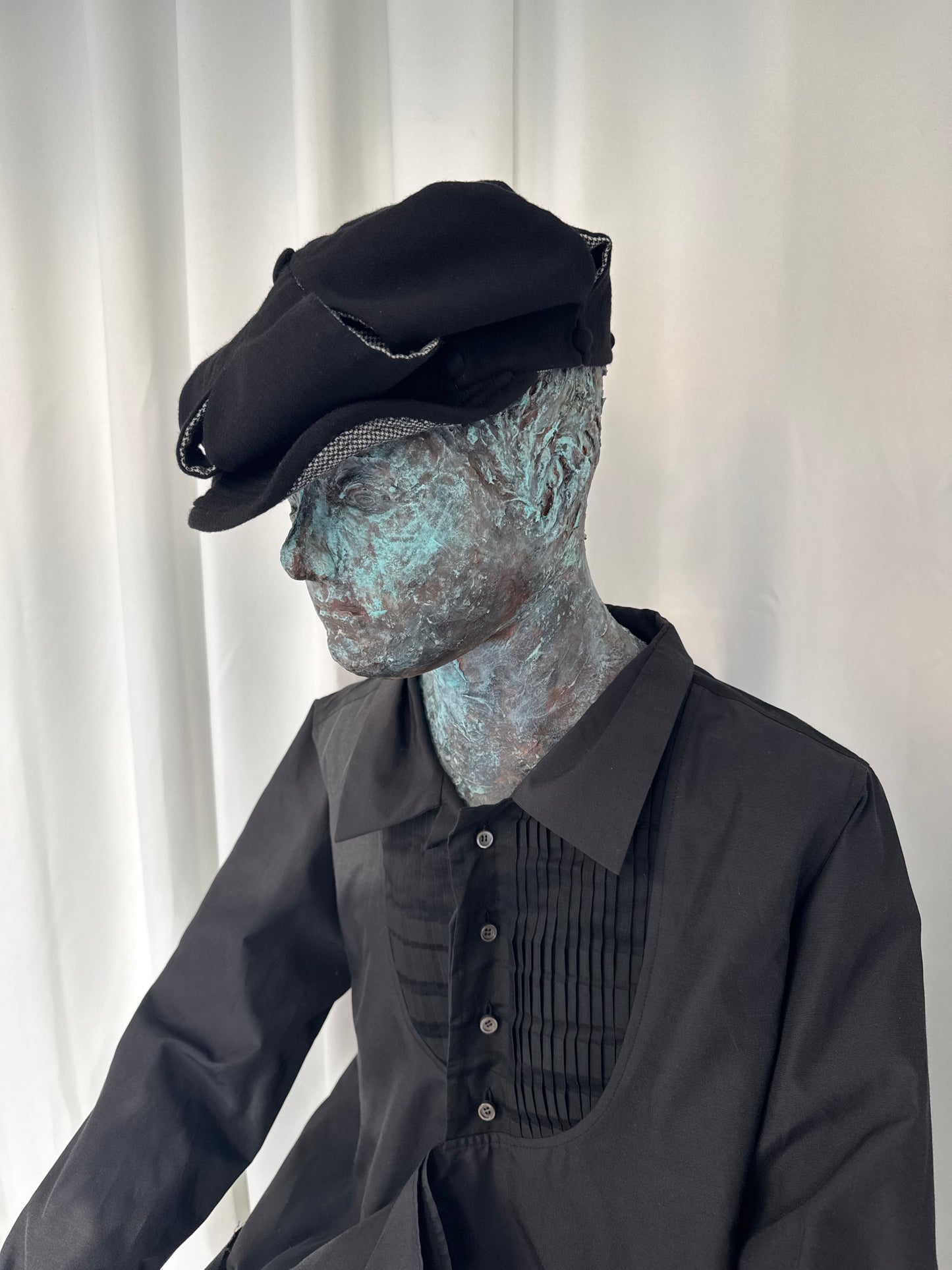 SLASHED REVERSIBLE NEWSBOY