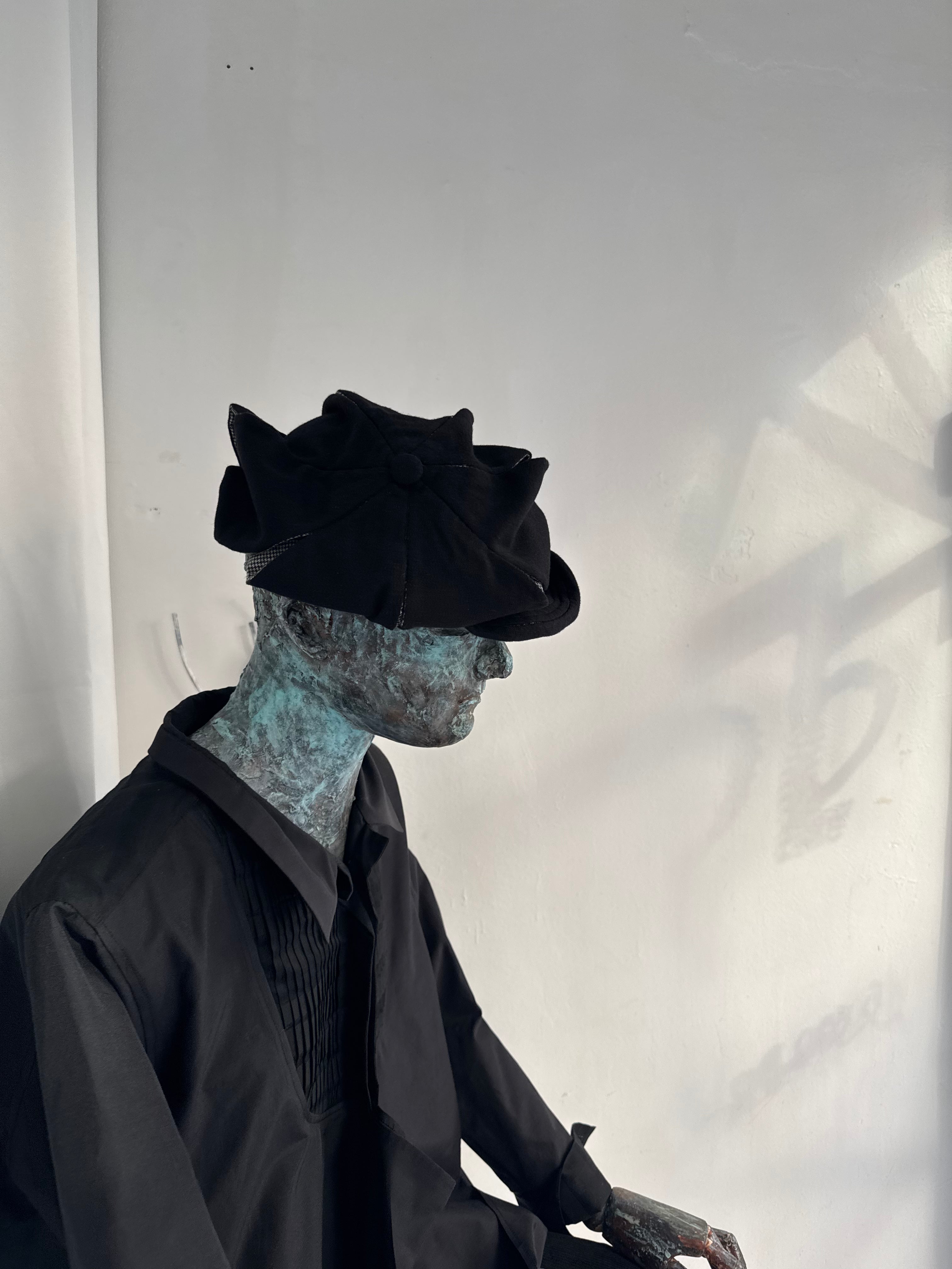 SLASHED REVERSIBLE NEWSBOY