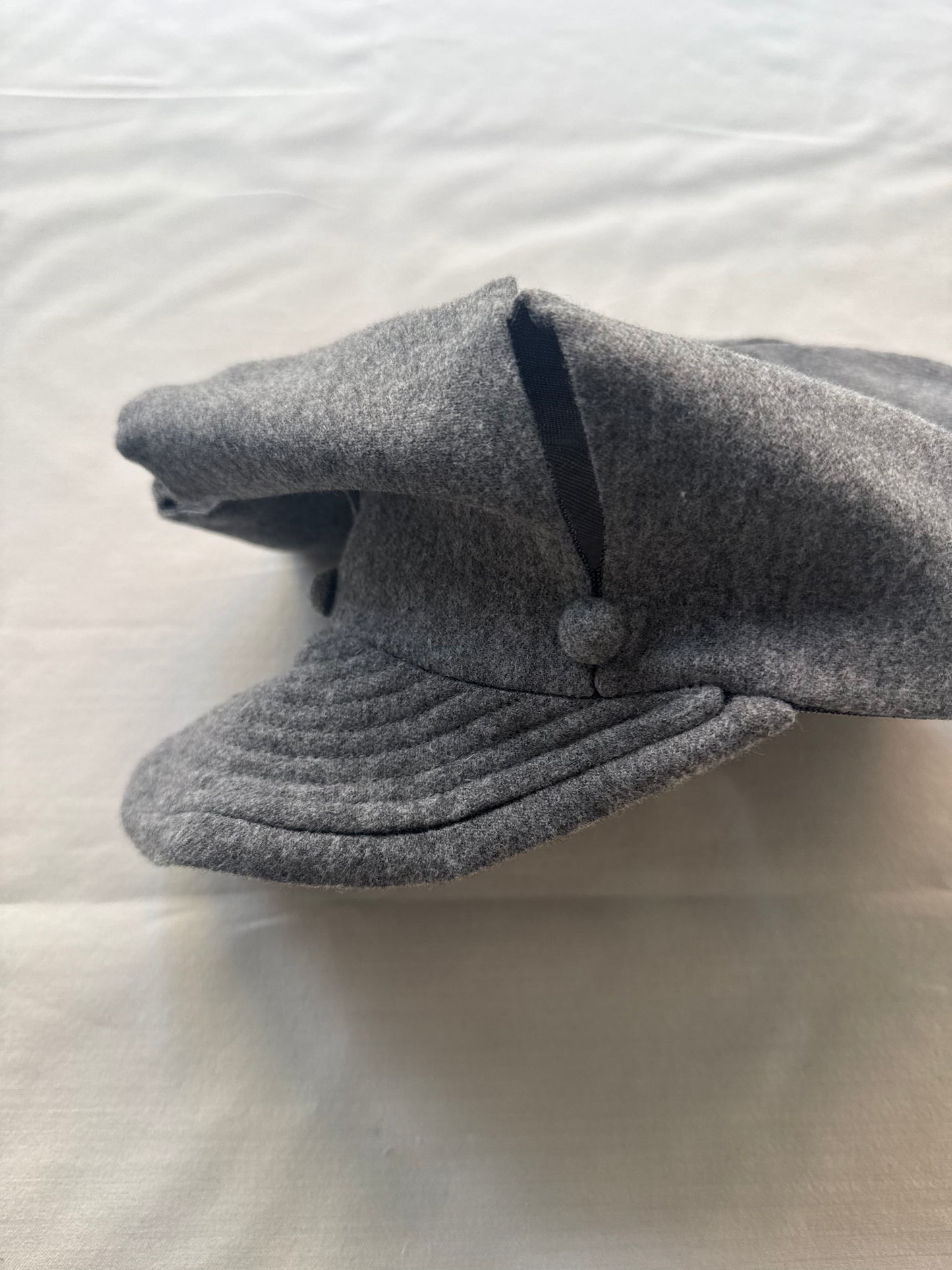 SLASHED REVERSIBLE NEWSBOY