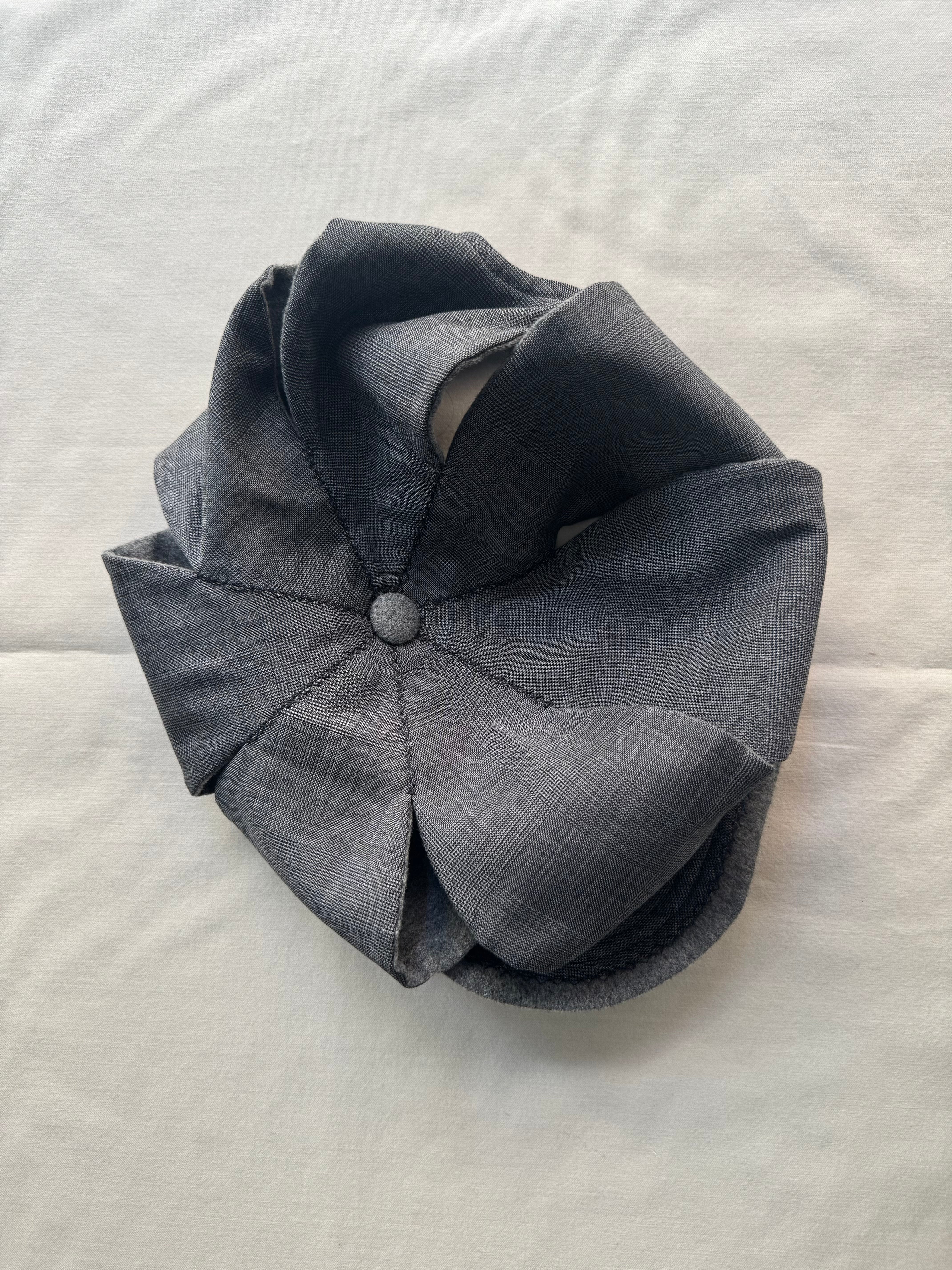 SLASHED REVERSIBLE NEWSBOY