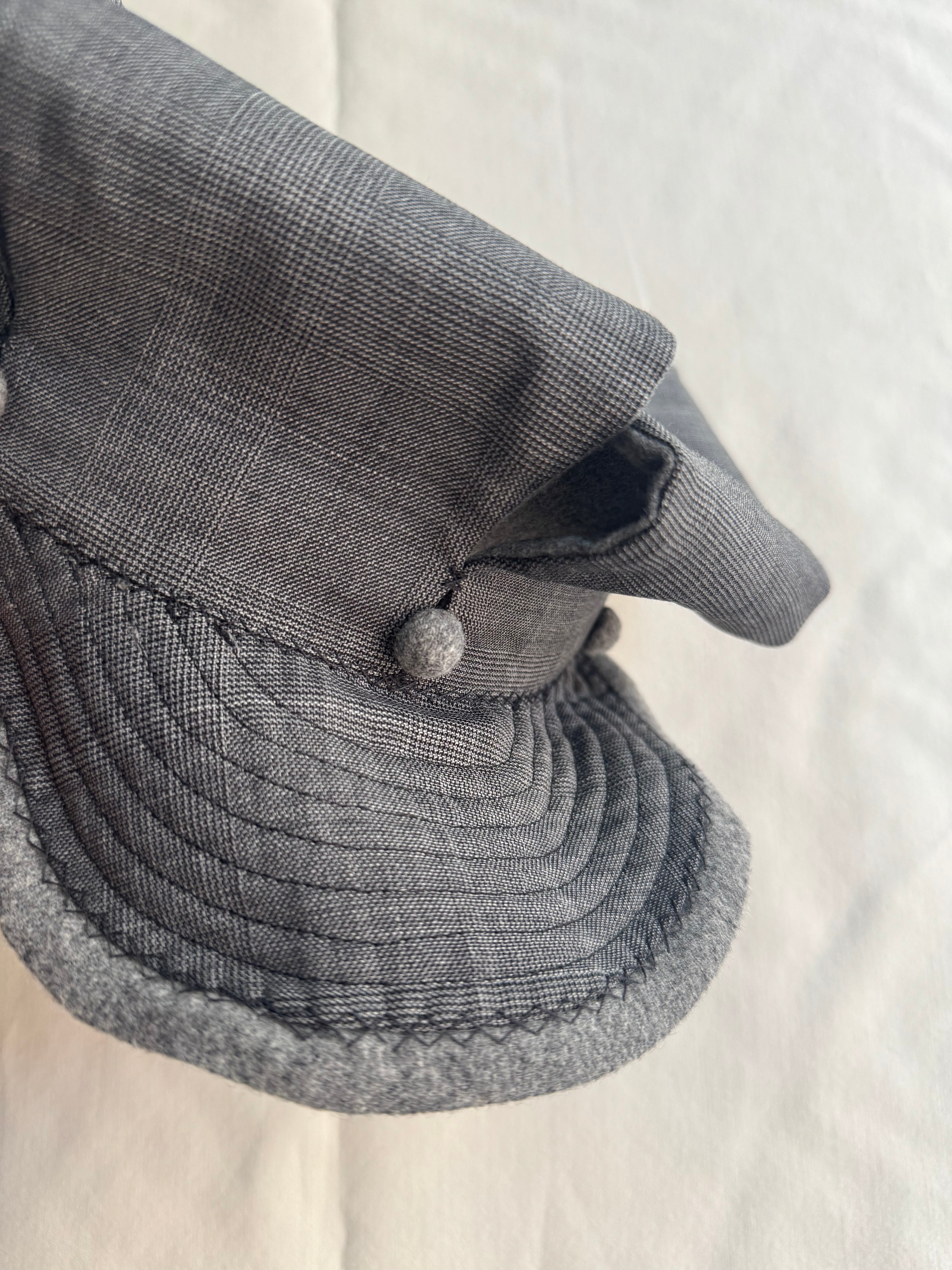 SLASHED REVERSIBLE NEWSBOY