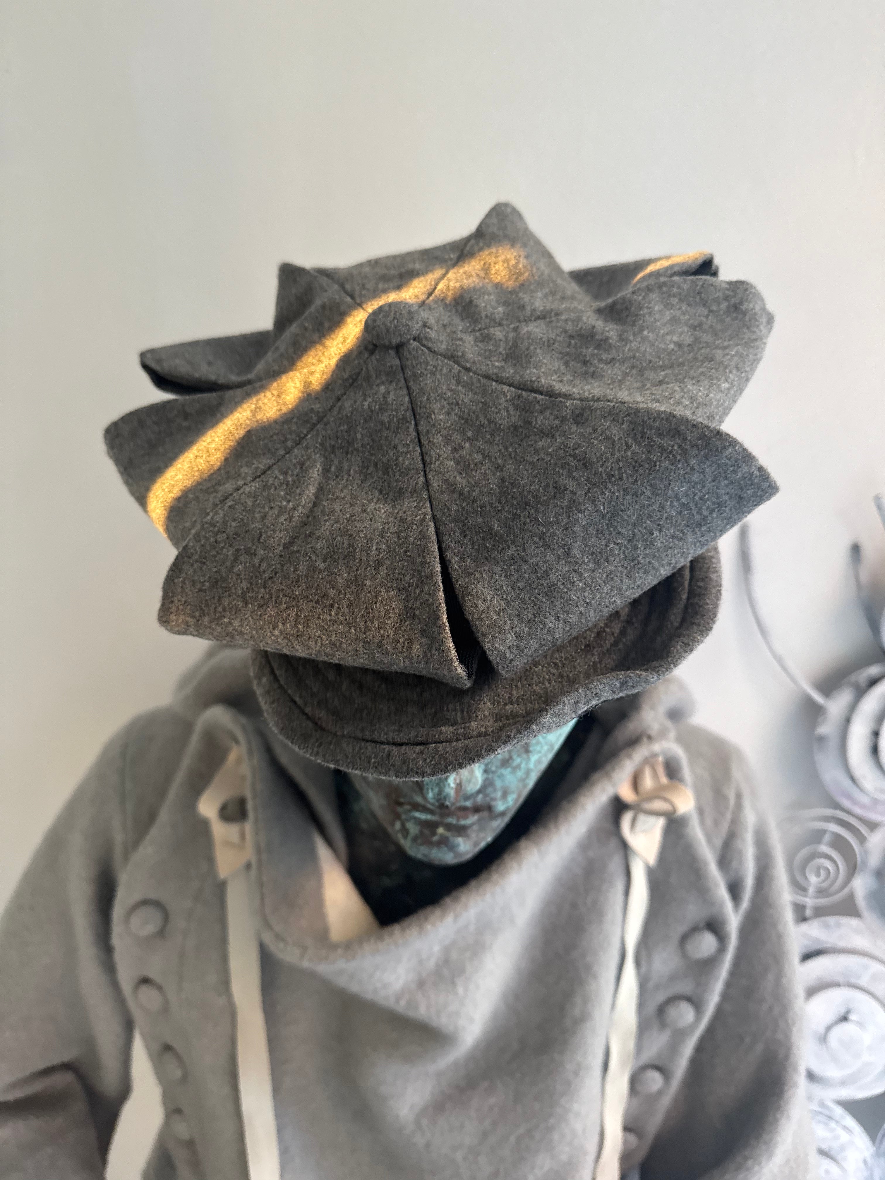 SLASHED REVERSIBLE NEWSBOY